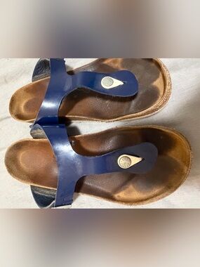 Well worn Birkenstock Navy Patent Buckle Sandals